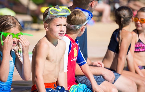 Kids swimming in Camp Anthem Summer Camp in Broomfield Colorado