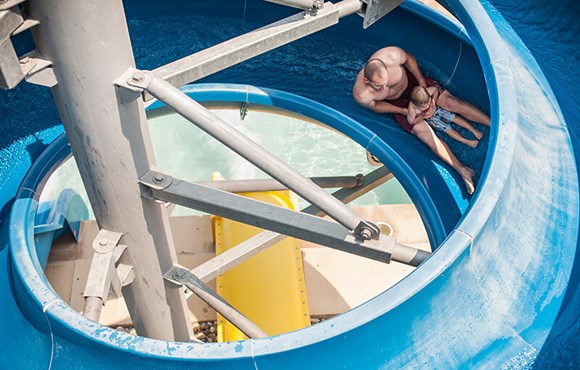 Kids on slide in Anthem community Broomfield, Colorado